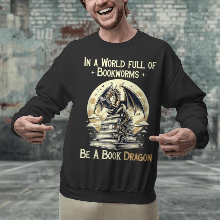 In a World Full Of Bookworms Be a Book Dragon Books Reading Unisex Sweatshirt In a World Full Of Bookworms Be a Book Dragon Books Reading Unisex Sweatshirt