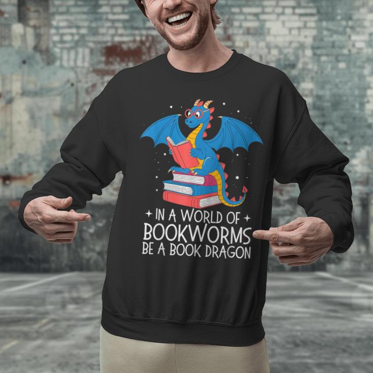 In A World Full Of Bookworms Be A Book Dragon Reading Unisex Sweatshirt