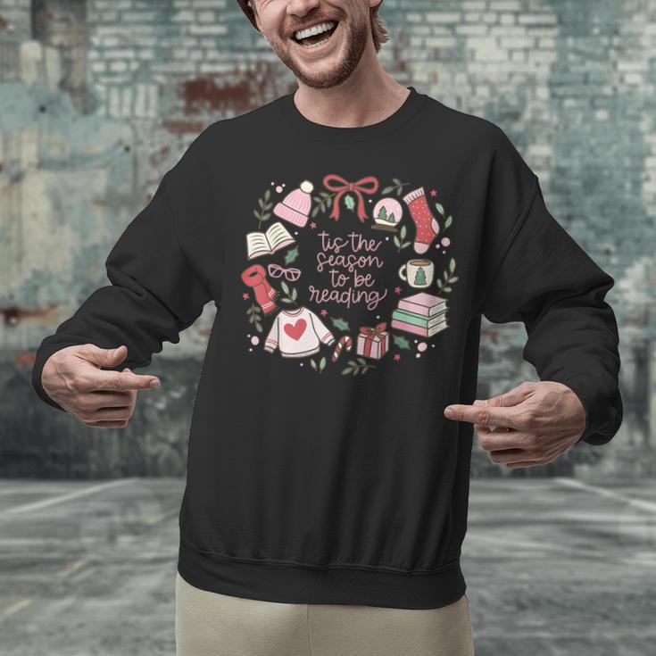 Xmas Tis The Season To Be Reading Books Pajamas Unisex Sweatshirt Xmas Tis The Season To Be Reading Books Pajamas Unisex Sweatshirt