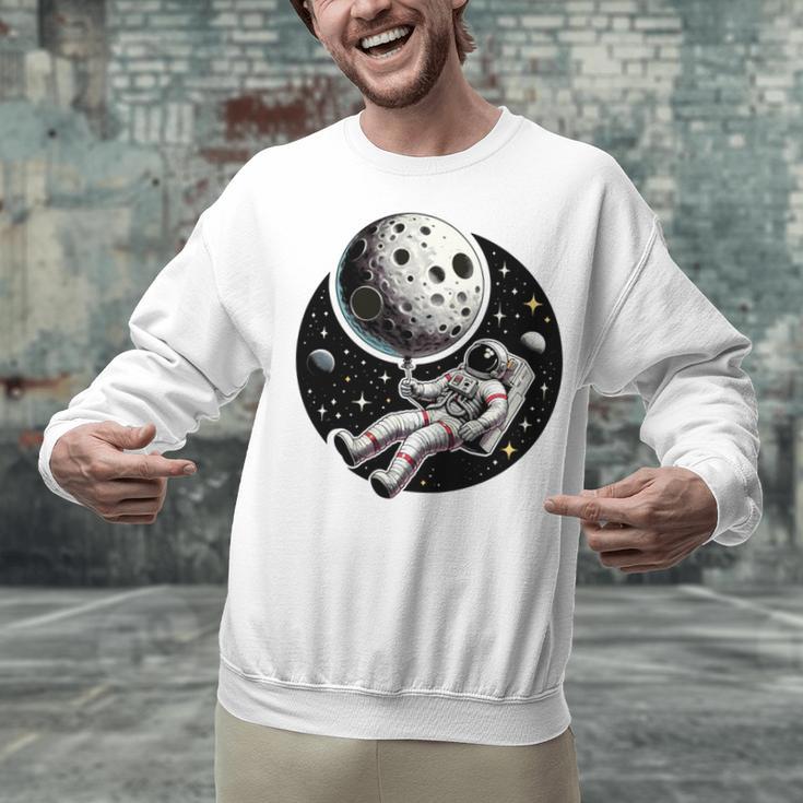 Astronaut Aesthetic Holding Moon Balloon Planets Introvert Unisex Sweatshirt