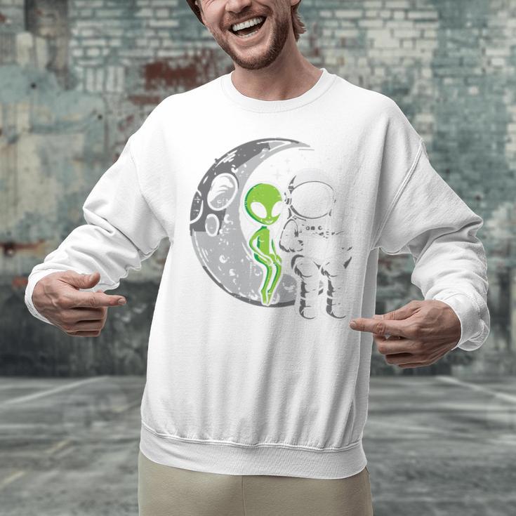 Astronaut Reading Book To Alien Moon Space Women Kids Men Premium Tri-Blend Unisex Sweatshirt