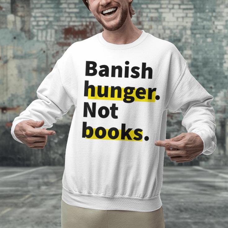 Banish Hunger Not Books Anti Fascism Pro Reading Quote Unisex Sweatshirt