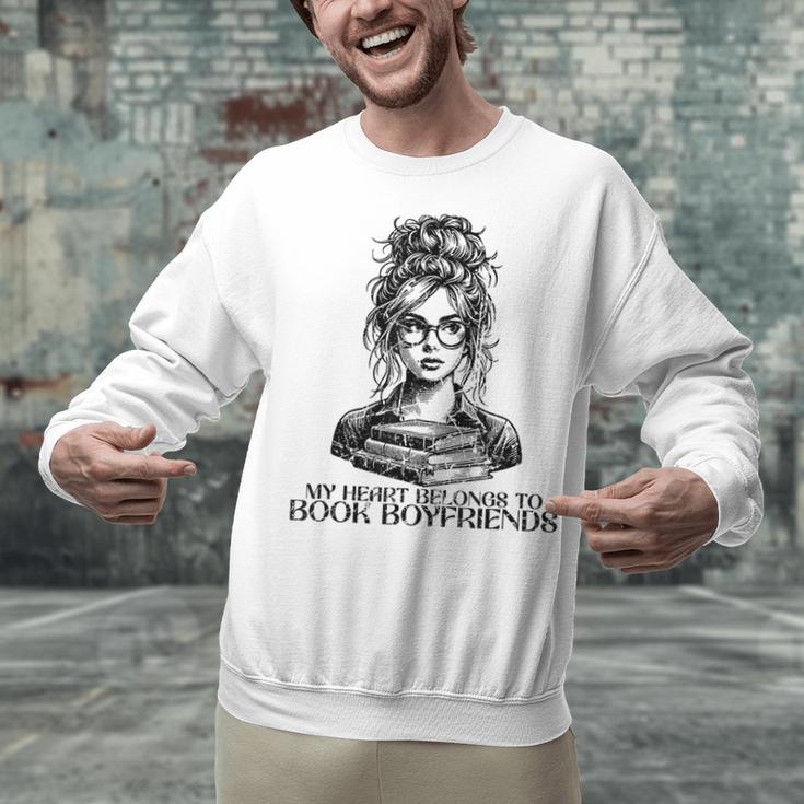 Book Lover Bent Over a Book Unisex Sweatshirt