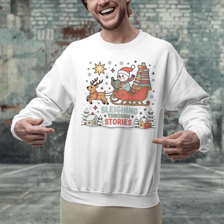 Book Lovers Winter Sleighing Through Stories Tee Premium Tri-Blend Unisex Sweatshirt