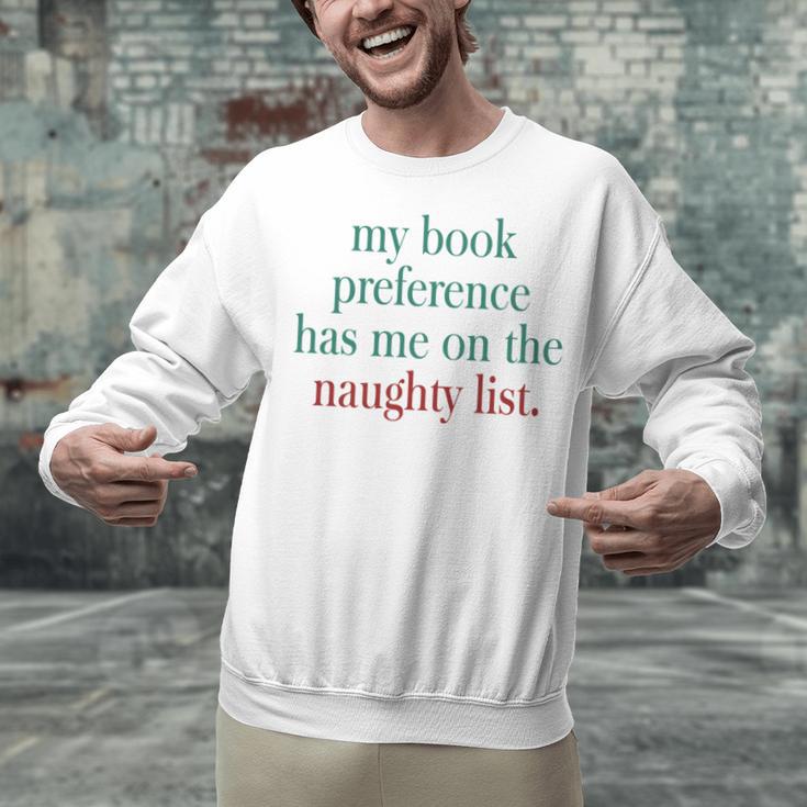 My Book Preference Has Me On The Naughty List For Christmas Unisex Sweatshirt My Book Preference Has Me On The Naughty List For Christmas Unisex Sweatshirt