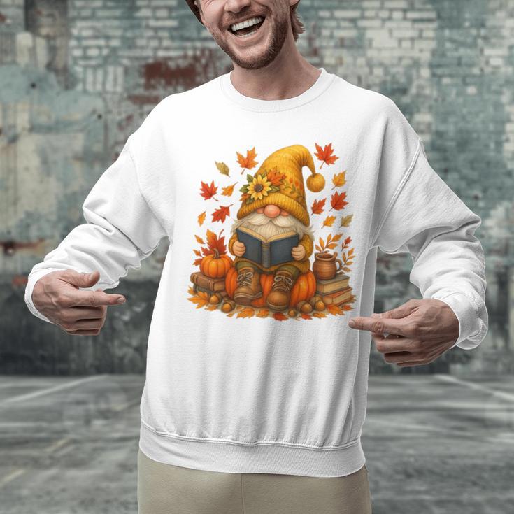 Cute Autumn Gnome Reading Pumpkin Book Lover Unisex Sweatshirt
