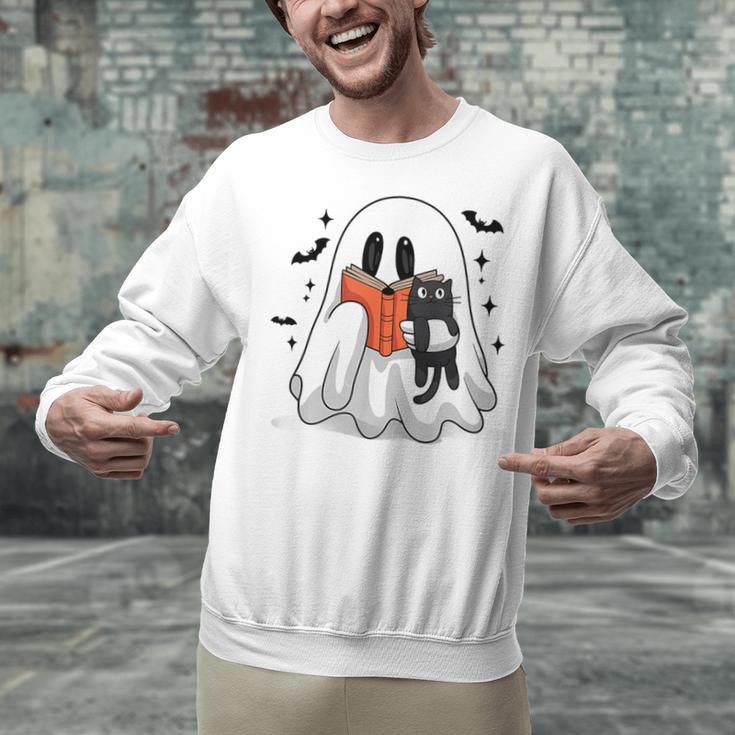 Cute Halloween Ghost Reading Book Unisex Sweatshirt