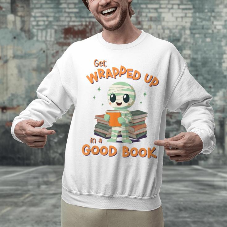 Cute Halloween Teacher Librarian Mummy Reading Books Unisex Sweatshirt Cute Halloween Teacher Librarian Mummy Reading Books Unisex Sweatshirt