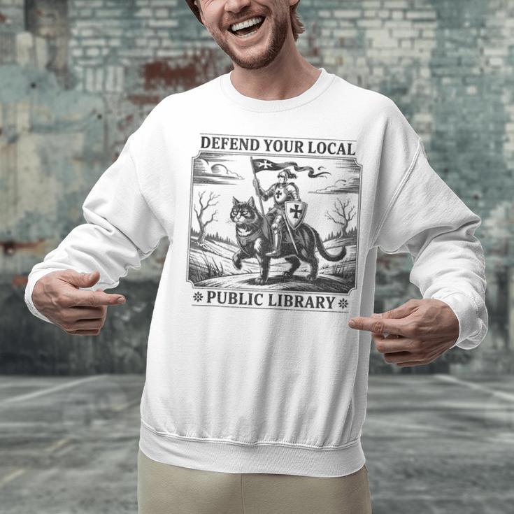 Defend Your Local Public Library Cat Knight Book Lover Unisex Sweatshirt