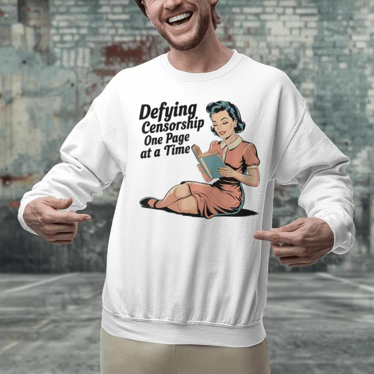 Defying Censorship One Page At a Time Read Banned Books Unisex Sweatshirt