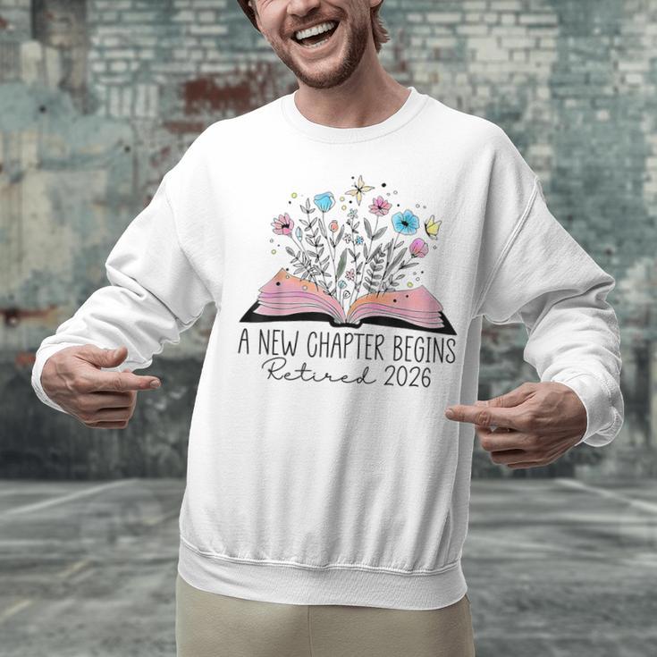 Floral Book A New Chapter Begins Retired 2026 Retirement Unisex Sweatshirt Floral Book A New Chapter Begins Retired 2026 Retirement Unisex Sweatshirt