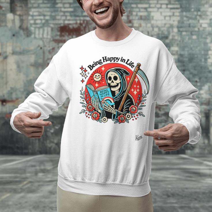 Grim Reaper Reads a Book Unisex Sweatshirt Grim Reaper Reads a Book Unisex Sweatshirt