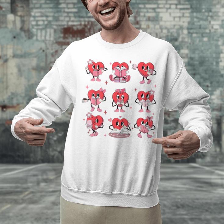Heart Holding Reading Books Valentine Teacher Book Lover Unisex Sweatshirt