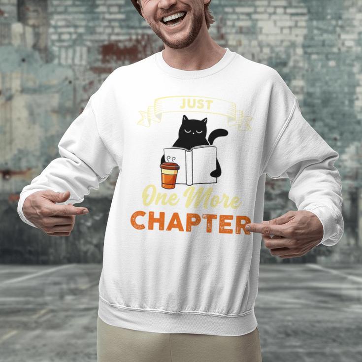 Just One More Chapter Fun Cat Coffee Reading Book Premium Tri-Blend Unisex Sweatshirt Just One More Chapter Fun Cat Coffee Reading Book Premium Tri-Blend Unisex Sweatshirt