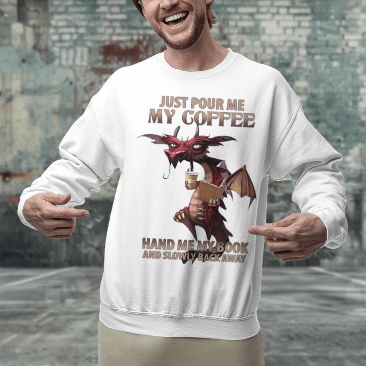 Just Pour Me My Coffee Hand Me My Book And Slowly Back Away Premium Unisex Sweatshirt