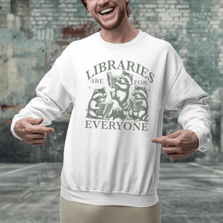 Libraries Are For Everyone Racoon Read Banned Book Librarian Unisex Sweatshirt