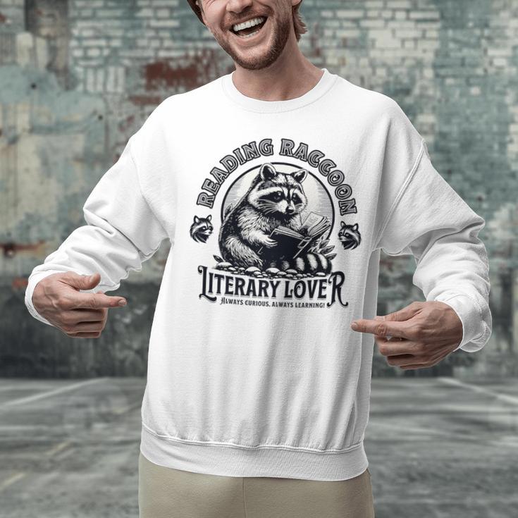 Literary Lover Reading Raccoon Books Premium Unisex Sweatshirt Literary Lover Reading Raccoon Books Premium Unisex Sweatshirt