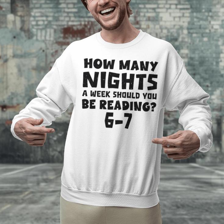 How Many Nights A Week Should You Be Reading 6-7 Book Lover Premium Tri-Blend Unisex Sweatshirt How Many Nights A Week Should You Be Reading 6-7 Book Lover Premium Tri-Blend Unisex Sweatshirt