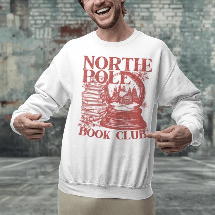 North Pole Book Club Christmas Unisex Sweatshirt North Pole Book Club Christmas Unisex Sweatshirt