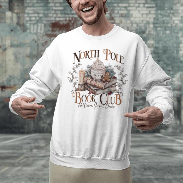North Pole Book-Club Hot Cocoa Served Daily Christmas Book Unisex Sweatshirt