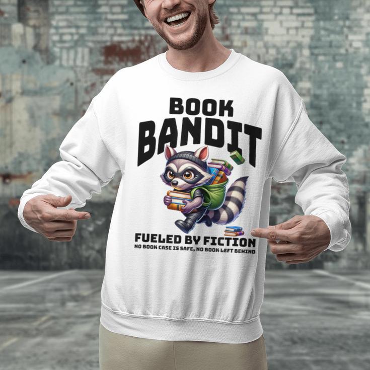 Racoon-Bookworm-Book Bandit-Fueled By Fiction Unisex Sweatshirt Racoon-Bookworm-Book Bandit-Fueled By Fiction Unisex Sweatshirt