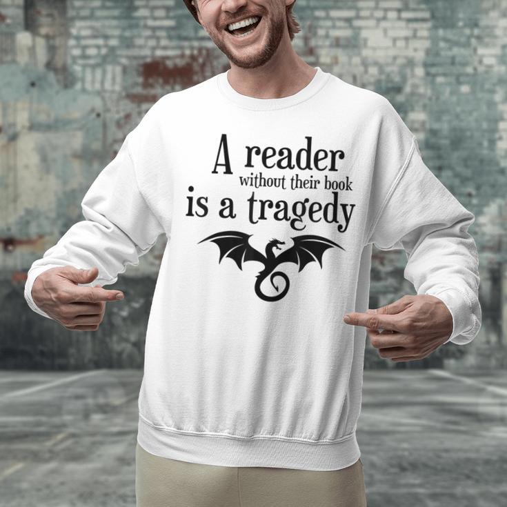 A Reader Without Their Book Is A Tragedy Dragon Rider Unisex Sweatshirt