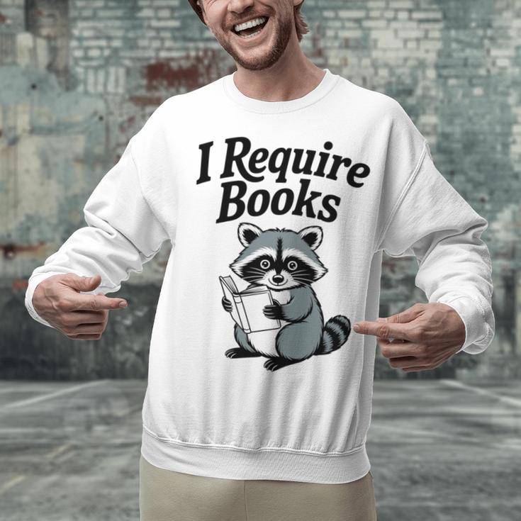 I Require Books Raccoon Reading For Book Lovers Unisex Sweatshirt I Require Books Raccoon Reading For Book Lovers Unisex Sweatshirt