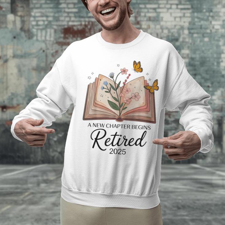 Retired 2025 A New Chapter Begins Retirement Teacher Book Unisex Sweatshirt