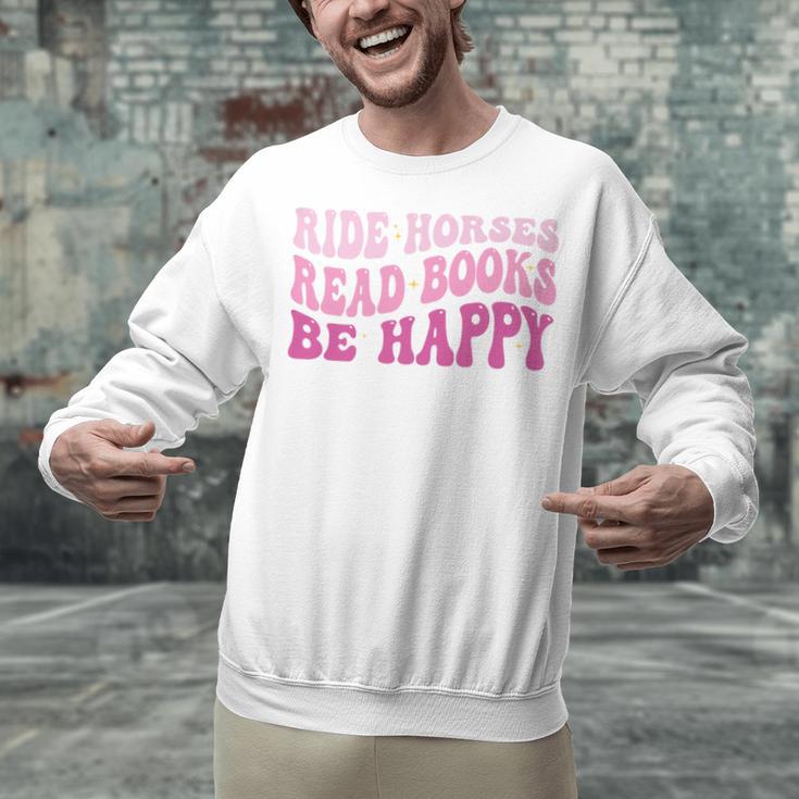 Ride Horses Read Books Be Happy Groovy Book Horse Premium Unisex Sweatshirt Ride Horses Read Books Be Happy Groovy Book Horse Premium Unisex Sweatshirt