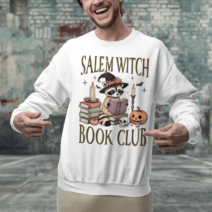 Salem Witch Book Club Raccoon Reading Unisex Sweatshirt Salem Witch Book Club Raccoon Reading Unisex Sweatshirt