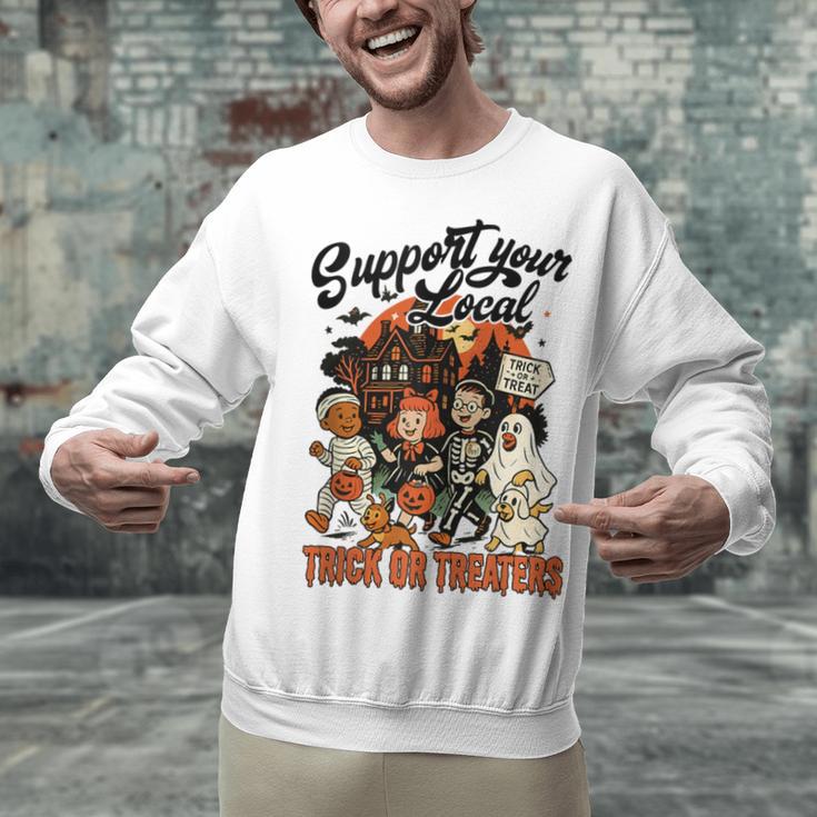 Support Your Local Trick Or Treaters Retro Spooky Nostalgia Unisex Sweatshirt