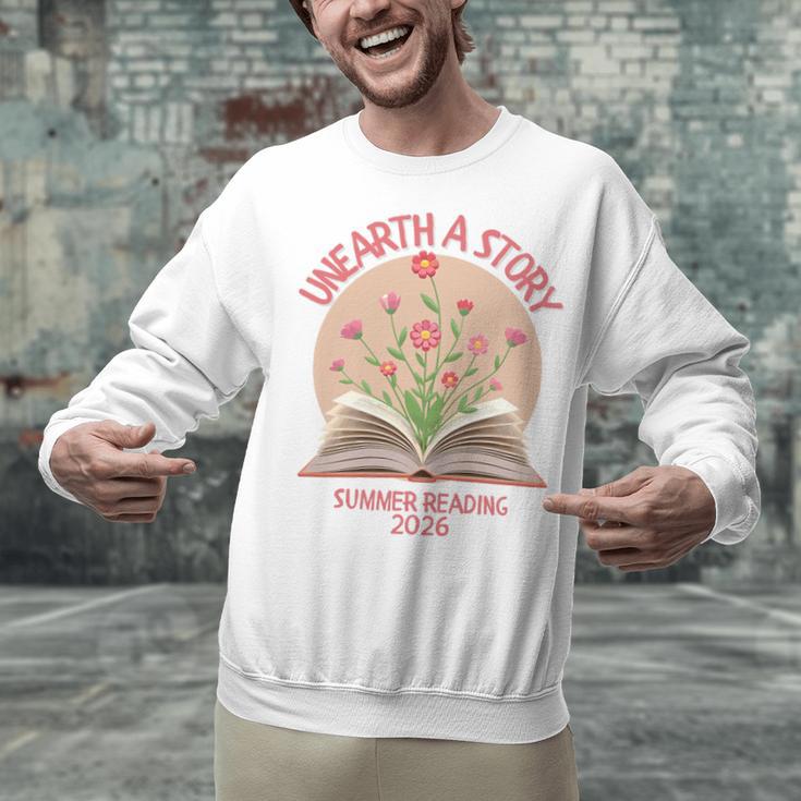 Unearth a Story 2026 Summer Reading Program Flowers Book Premium Tri-Blend Unisex Sweatshirt Unearth a Story 2026 Summer Reading Program Flowers Book Premium Tri-Blend Unisex Sweatshirt
