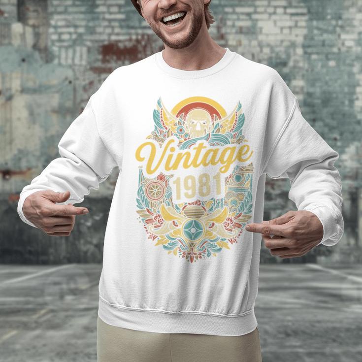 Vintage 1981 Retro Badge Nostalgia Eighties Compass Skull Premium Tri-Blend Unisex Sweatshirt