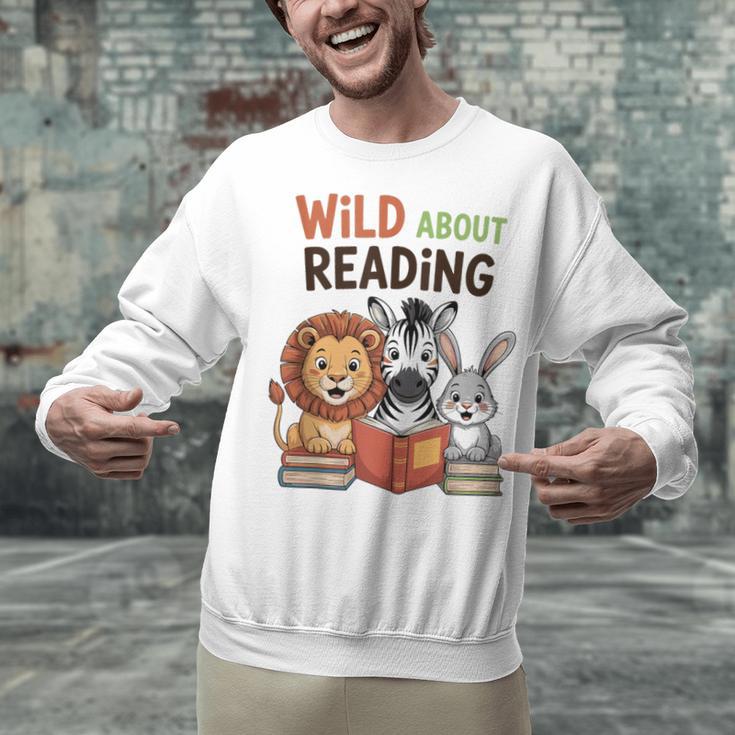 Wild About Reading Zoo Animals For Bookworm Book Reader Unisex Sweatshirt Wild About Reading Zoo Animals For Bookworm Book Reader Unisex Sweatshirt