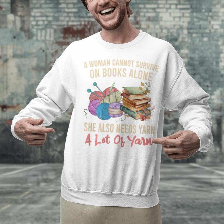 A Woman Cannot Survive On Books Alone She Needs Yarn Crochet Premium Tri-Blend Unisex Sweatshirt A Woman Cannot Survive On Books Alone She Needs Yarn Crochet Premium Tri-Blend Unisex Sweatshirt