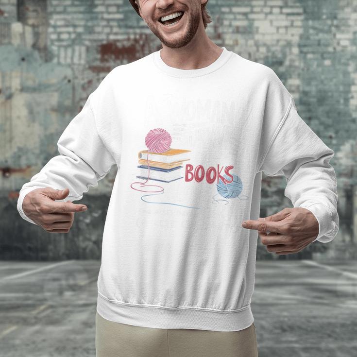 A Woman Cannot Survive On Books Alone She Also Needs Yarn Premium Unisex Sweatshirt