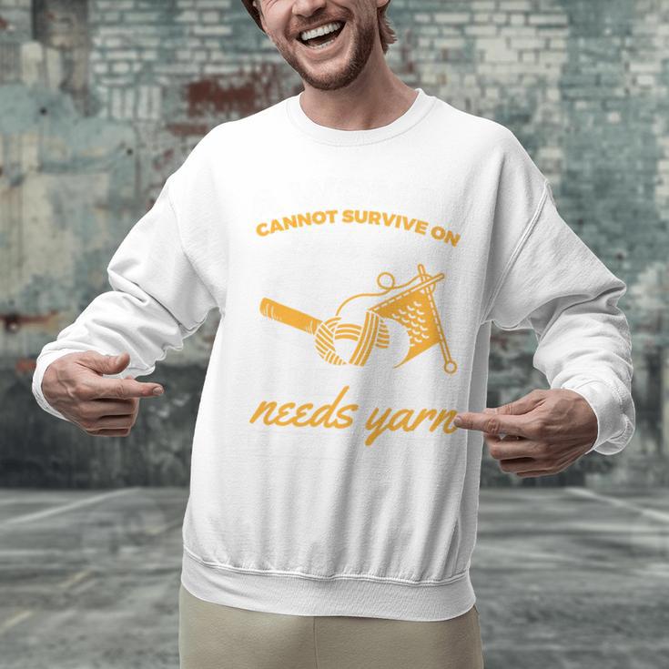 Woman Survives On Books Yarn Knitting Crochet Premium Tri-Blend Unisex Sweatshirt