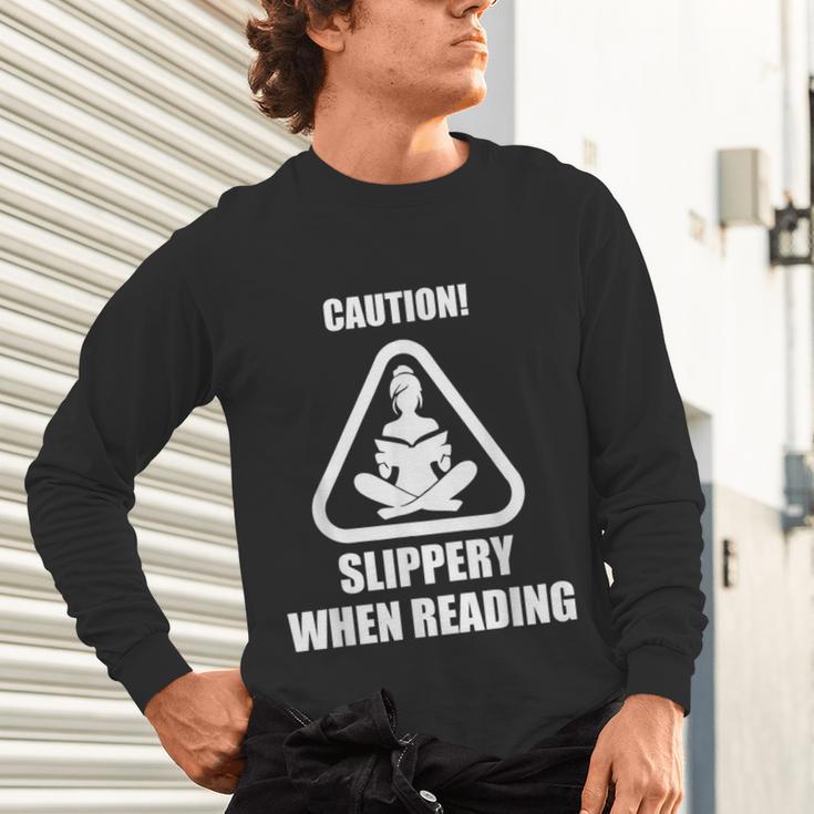 Caution Slippery When Reading Book Lover Unisex Long Sleeve T-Shirt Caution Slippery When Reading Book Lover Unisex Long Sleeve T-Shirt