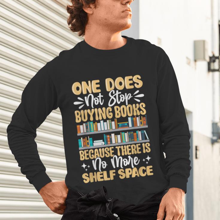 One Does Not Stop Buying Books Because There Is No More Shel Unisex Long Sleeve T-Shirt One Does Not Stop Buying Books Because There Is No More Shel Unisex Long Sleeve T-Shirt