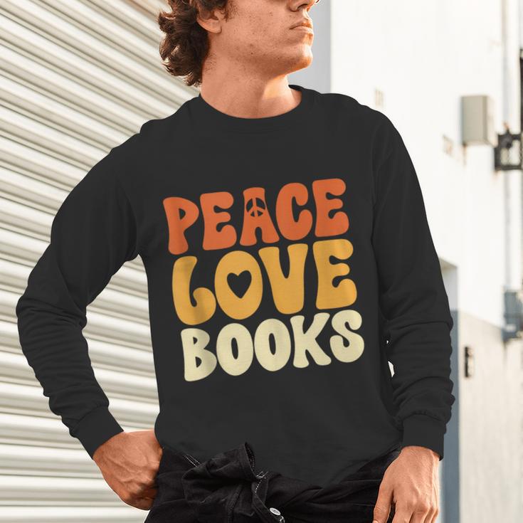 Peace Love Books Men Women Unisex Long Sleeve T-Shirt Peace Love Books Men Women Unisex Long Sleeve T-Shirt