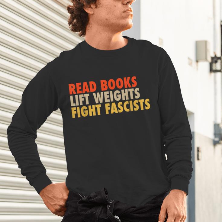 Read Books Lift Weights Fight Fascists Reading Humor Unisex Long Sleeve T-Shirt Read Books Lift Weights Fight Fascists Reading Humor Unisex Long Sleeve T-Shirt