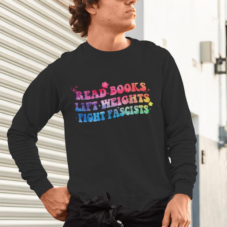 Read Books Lift Weights Fight Fascists Tie Dye Men Women Unisex Long Sleeve T-Shirt Read Books Lift Weights Fight Fascists Tie Dye Men Women Unisex Long Sleeve T-Shirt