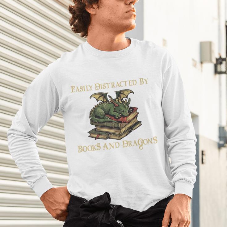 Easily Distracted By Books And Dragons Graphic Premium Unisex Long Sleeve T-Shirt Easily Distracted By Books And Dragons Graphic Premium Unisex Long Sleeve T-Shirt