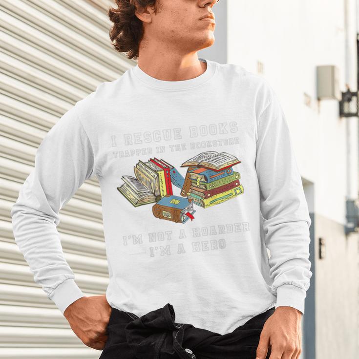 I Rescue Book Trapped In The Bookstore I'm Not A Hoarder Premium Tri-Blend Unisex Long Sleeve T-Shirt I Rescue Book Trapped In The Bookstore I'm Not A Hoarder Premium Tri-Blend Unisex Long Sleeve T-Shirt