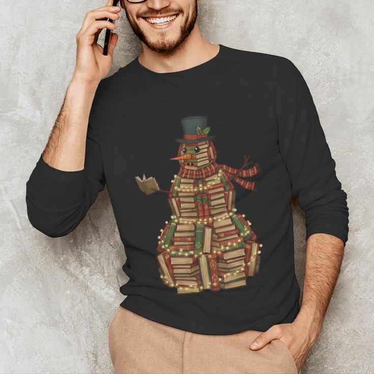 Christmas Snowman Made Of Books Holiday Reading Xmas Unisex Long Sleeve T-Shirt Christmas Snowman Made Of Books Holiday Reading Xmas Unisex Long Sleeve T-Shirt