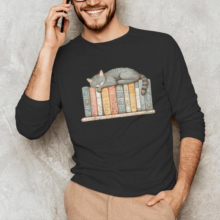 Cute Cat Sleeping On Books Unisex Long Sleeve T-Shirt Cute Cat Sleeping On Books Unisex Long Sleeve T-Shirt