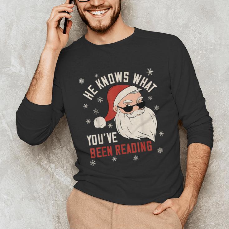 He Knows What You'Ve Been Reading Book Lover Women Santa Unisex Long Sleeve T-Shirt He Knows What You'Ve Been Reading Book Lover Women Santa Unisex Long Sleeve T-Shirt