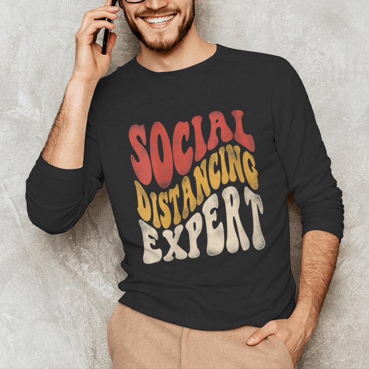 Social Distancing Expert Introvert Unisex Long Sleeve T-Shirt Social Distancing Expert Introvert Unisex Long Sleeve T-Shirt