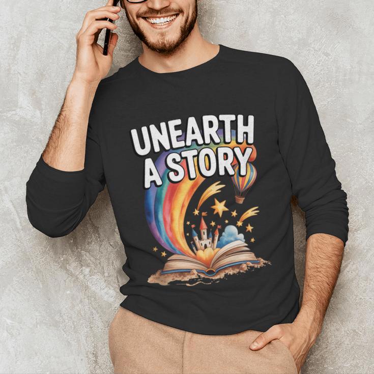 Unearth A Story Rainbow Treasure Book Unisex Long Sleeve T-Shirt Unearth A Story Rainbow Treasure Book Unisex Long Sleeve T-Shirt
