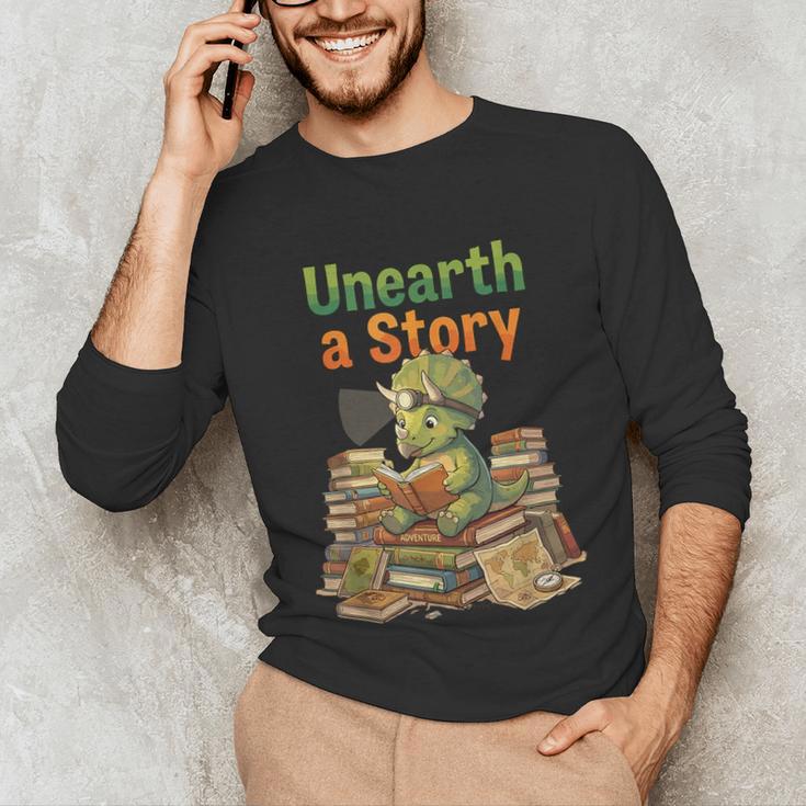 Unearth a Story Triceratops Dinosaur Reading Books Cute Dino Unisex Long Sleeve T-Shirt Unearth a Story Triceratops Dinosaur Reading Books Cute Dino Unisex Long Sleeve T-Shirt